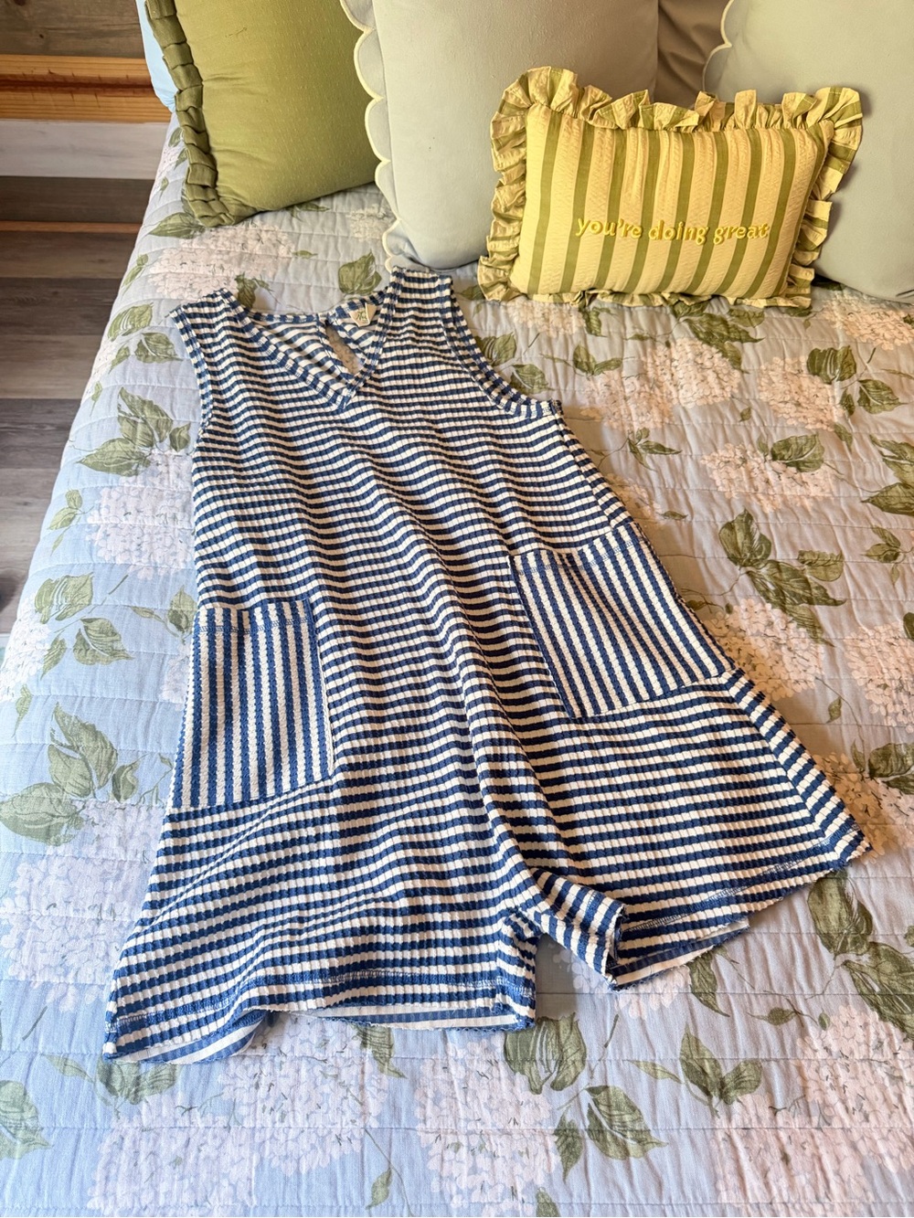 Sleeveless Blue and White Striped Romper with Front Pockets